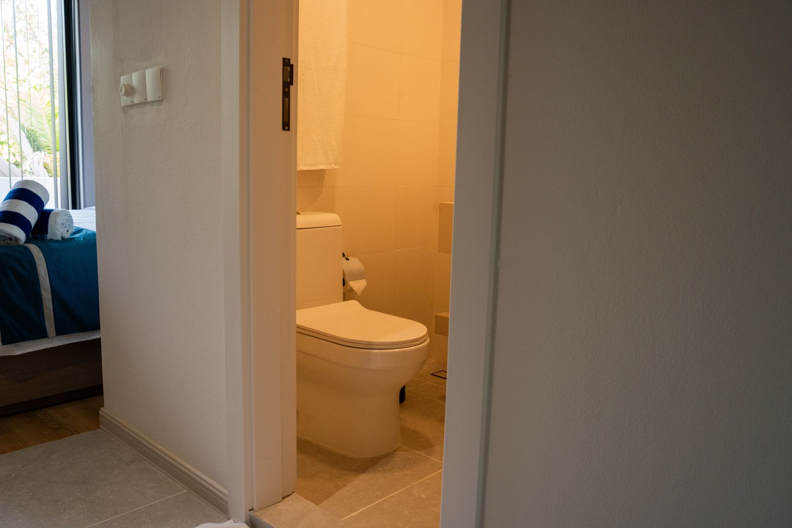 En-suite toilet adjoining the guest room