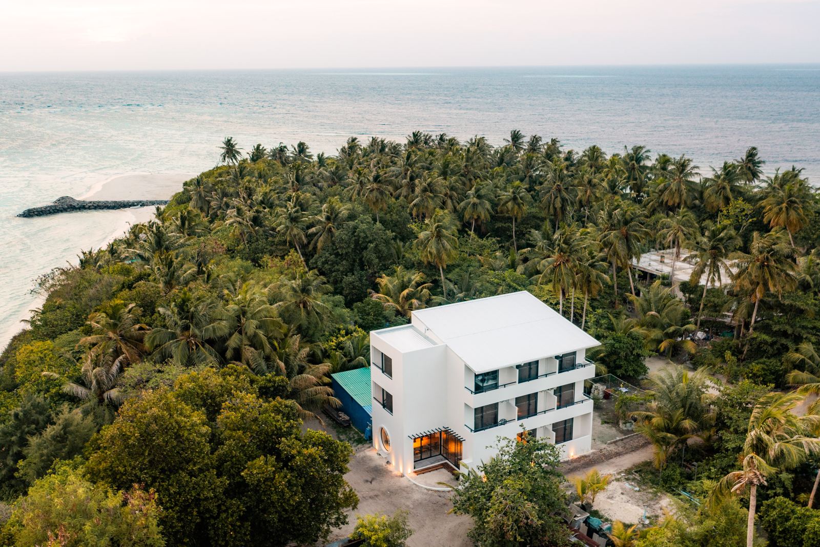 Guesthouse among the palms
