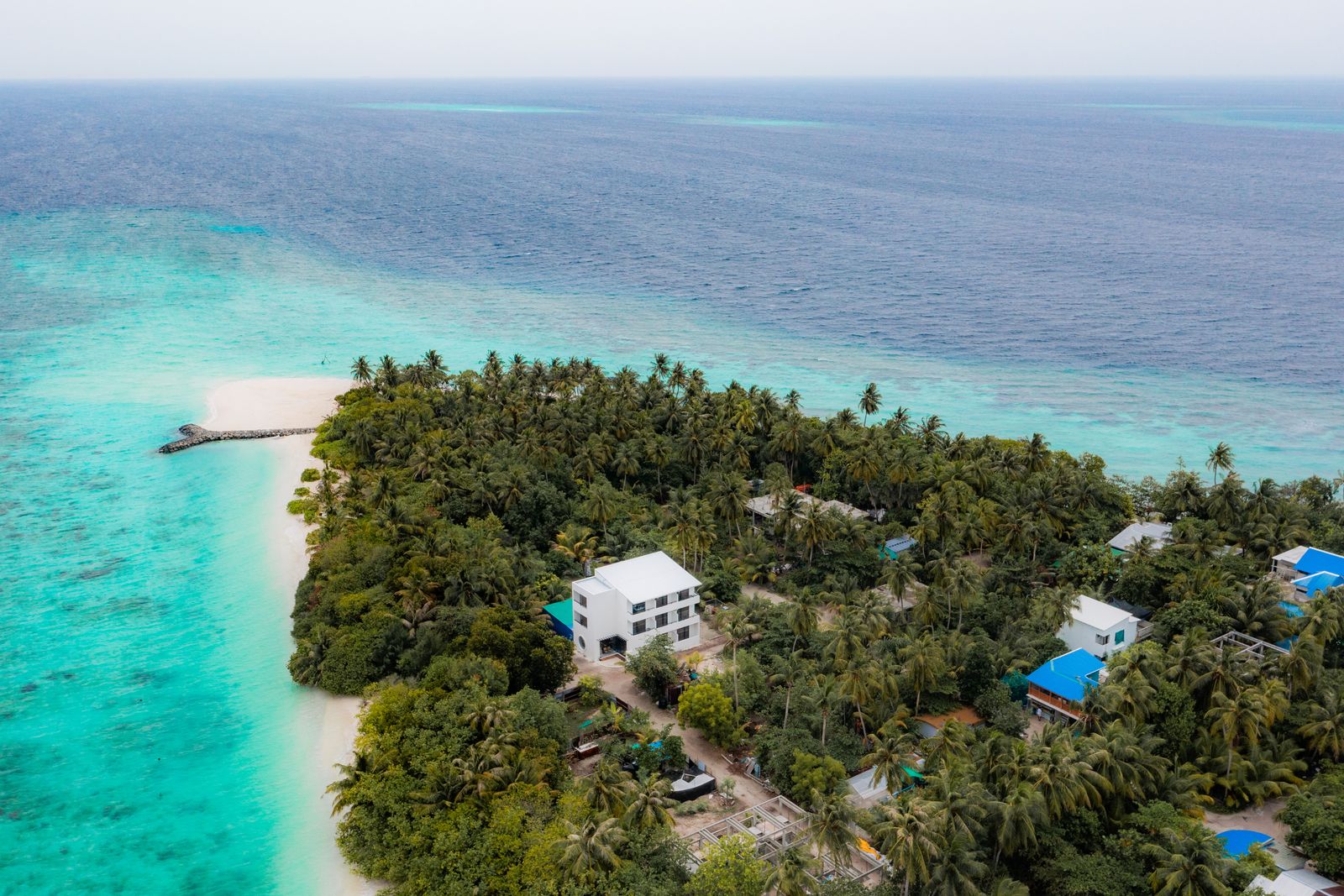 Kashiveli near the island's tip, sandbank curving into the lagoon