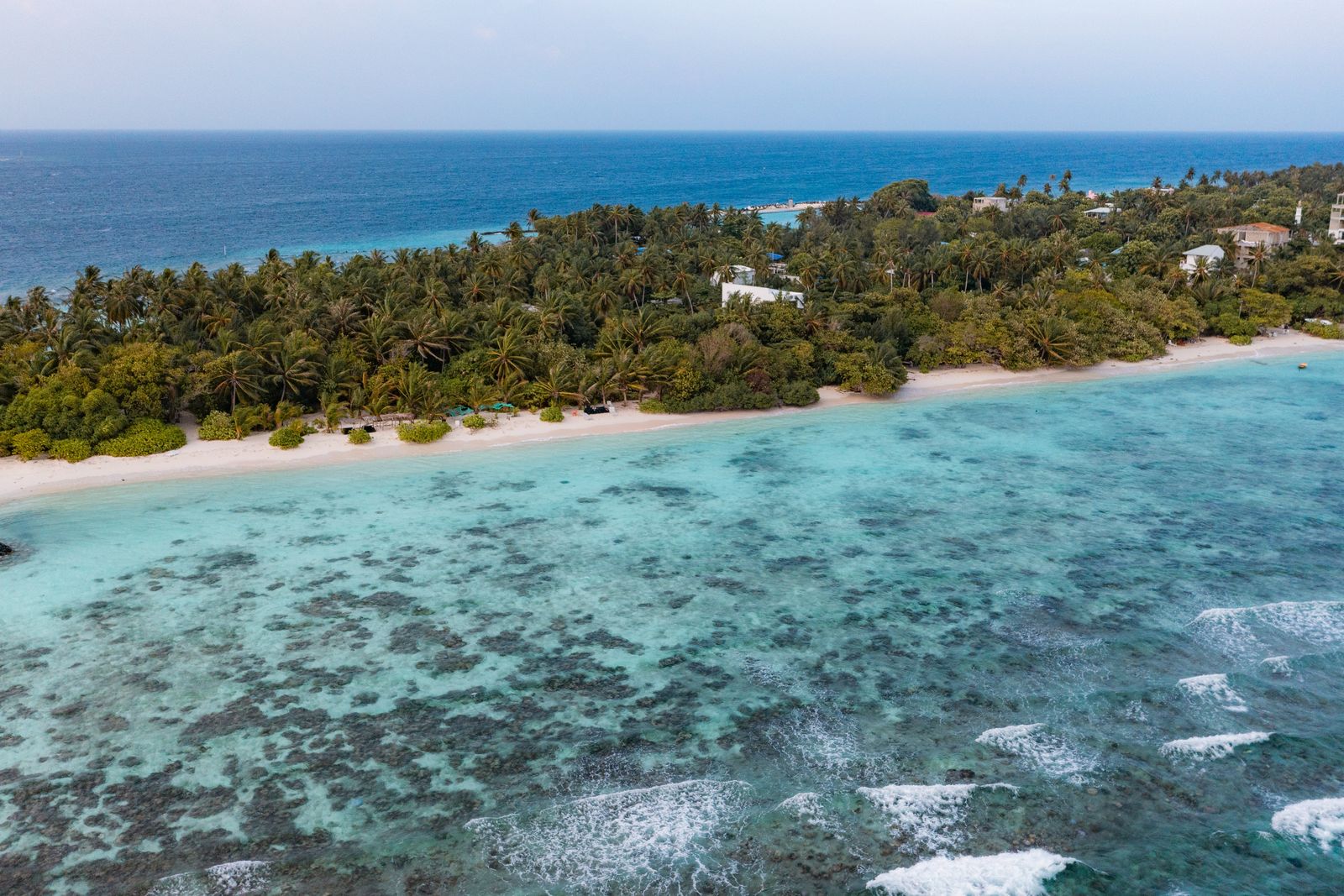 Omadhoo's shoreline and the coral reef just offshore
