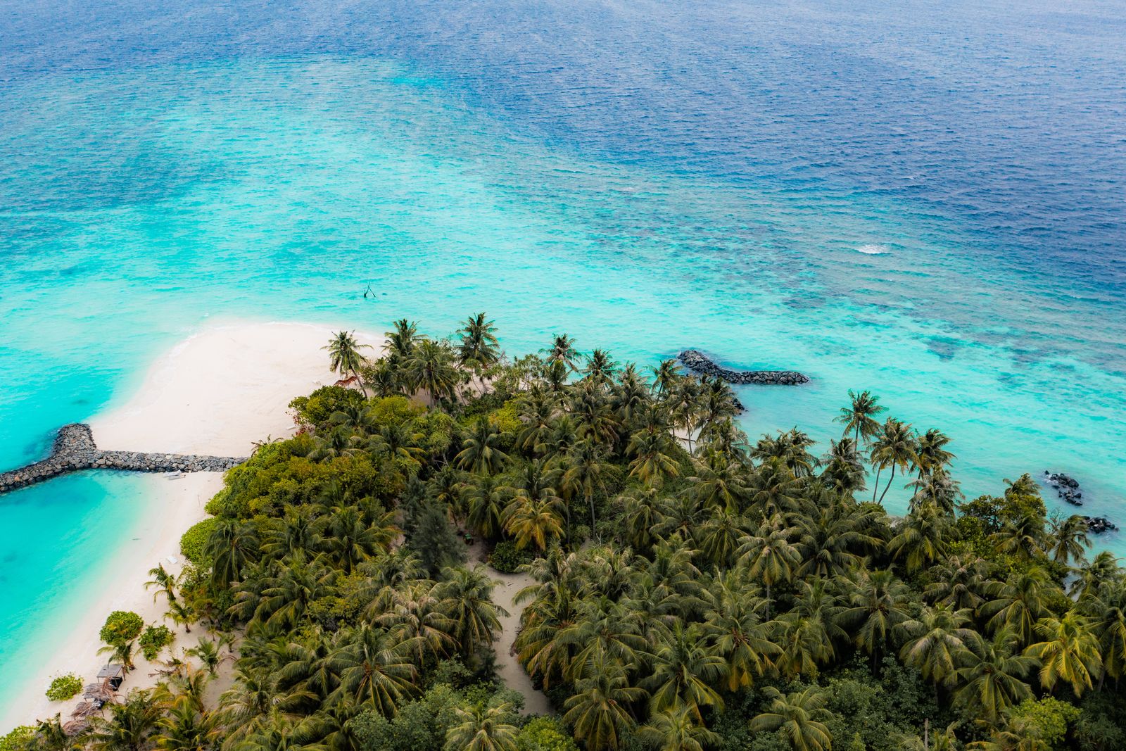 Omadhoo's sandbank and turquoise shallows from the air